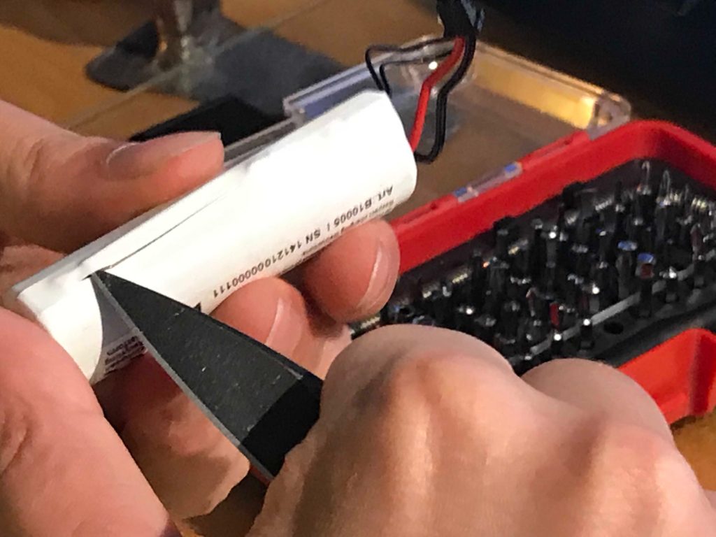 Slicing open stock Crafty battery wrapper